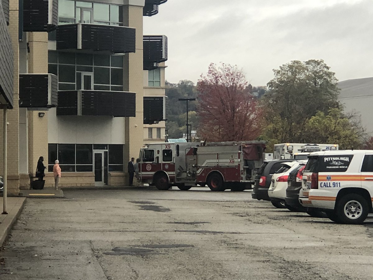 bomb squad investigating suspicious car with language on driver