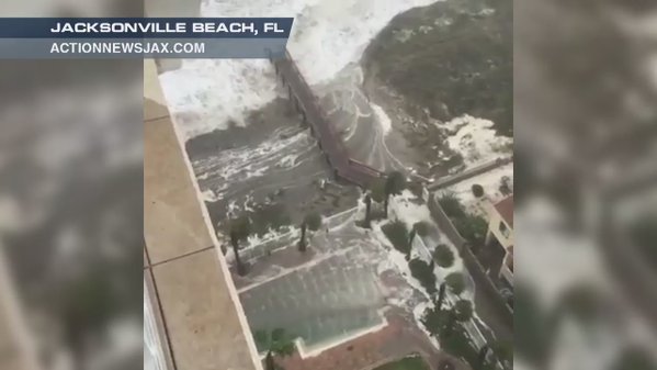 Storm surge inundating streets in Jacksonville Beach FL