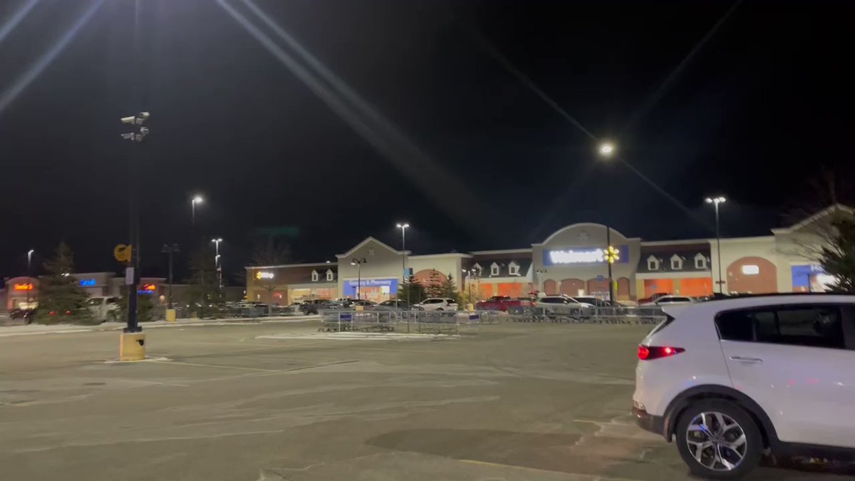 Scene of a reported shooting at the Walmart parking lot in Scarborough. A back section of the parking lot is roped off