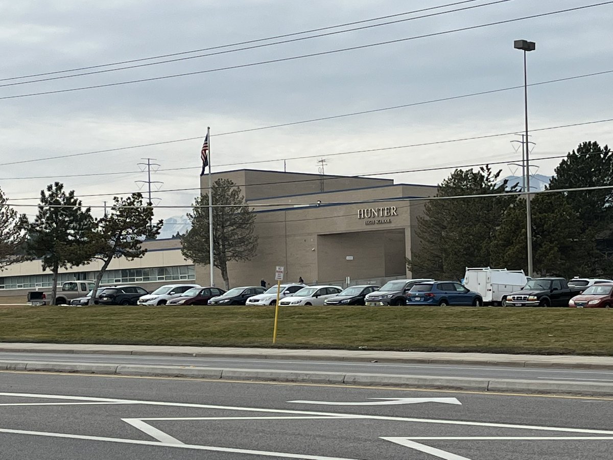 The scene outside Hunter High School. This is one school under shelter in place protocols due to a shooting nearby. Two people dead in that shooting. Multiple suspects in custody