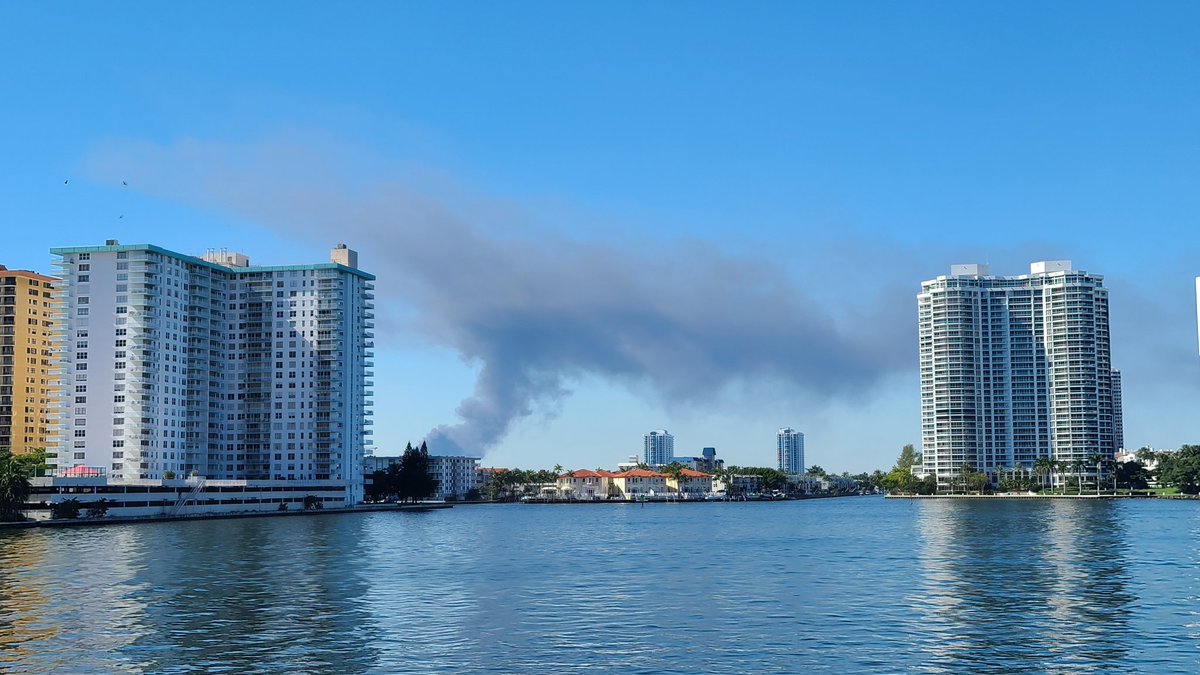 Smoke from junkyard fire in Opa Locka visible from Sunny Isles Beach