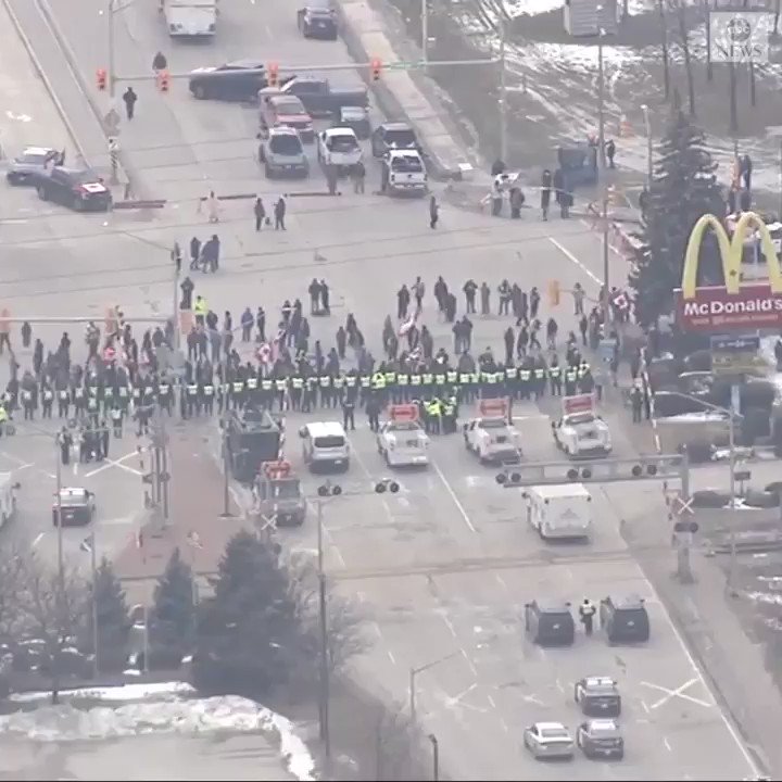 Aerial footage shows Canadian police blocking off the area surrounding the Ambassador Bridge over the U.S.-Canadian border