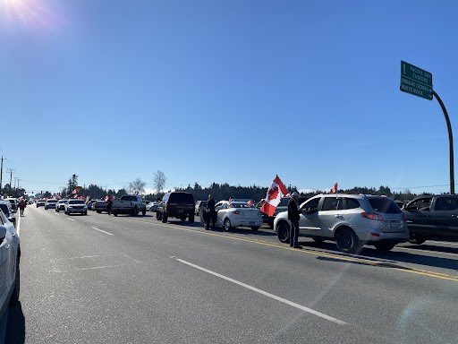 The convoy that began in Chilliwack this morning is expected to arrive soon. Demonstrators have begun parking their vehicles in the middle of the road, along Highway 15. RCMP are diverting vehicles away from the area