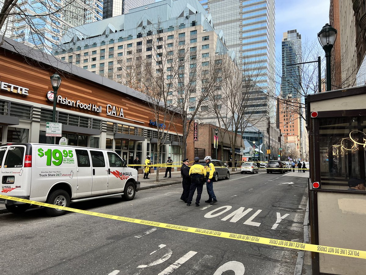 Road rage shooting at 17th and Chestnut - witness says a driver refused to move out of another car's way, turned into a scuffle on the sidewalk and one man pulled a gun. Police at scene say 2 were shot.