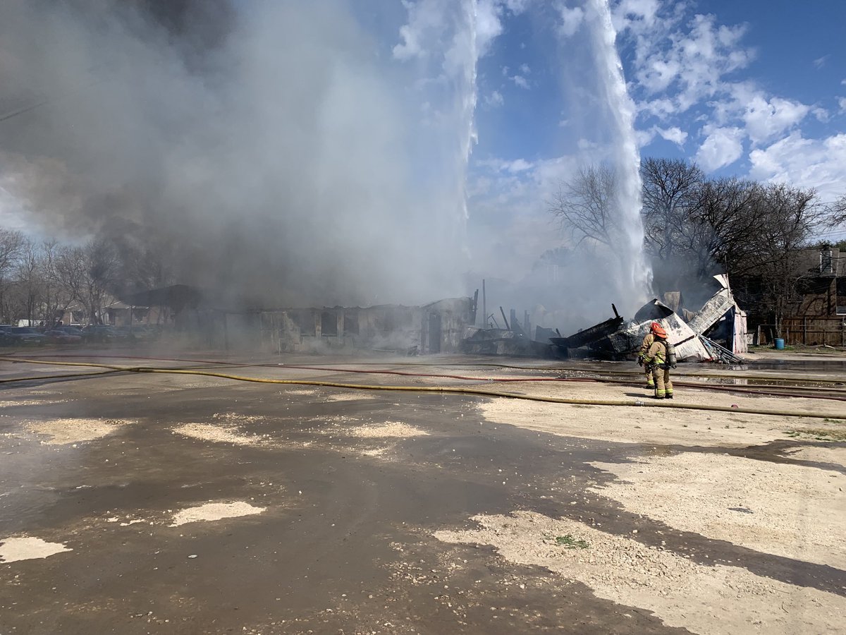 Working fire 6940 S. I-35, storage building at automotive lot fully involved on arrival. Fire is defensive. No further info available