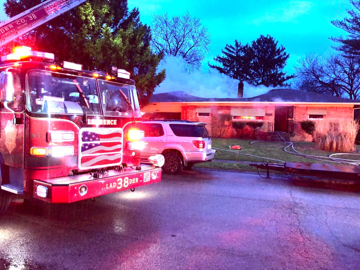 Firefighters from IFD & from Lawrence are working to put out the flames in this burning home on Irwin Ave, near 46th &amp; Shadeland on Indy's northeast side. It looks like the roof has collapsed in the center of the home, no word yet if there are injuries