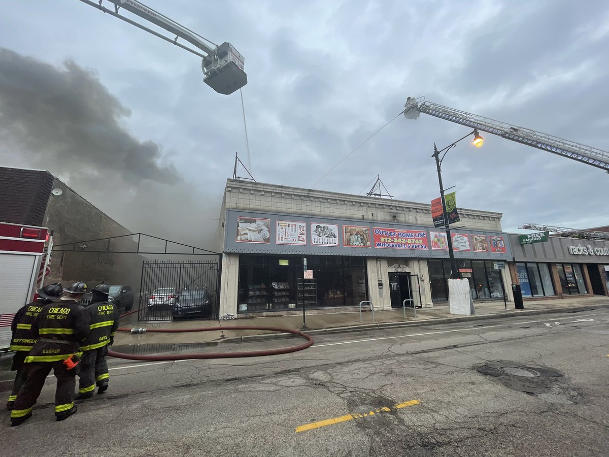 2 11 alarm a fire 3040 west Lawrence. Jojo  discount store. Heavy fire load truss roof.  No injuries reported