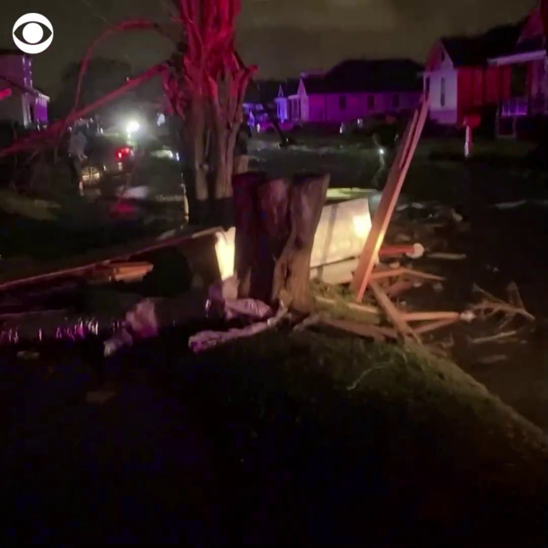 Residents survey damage in the Arabi neighborhood of New Orleans after a tornado tore through parts of the city and its suburbs Tuesday night, leaving a trail of destruction and killing at least one person