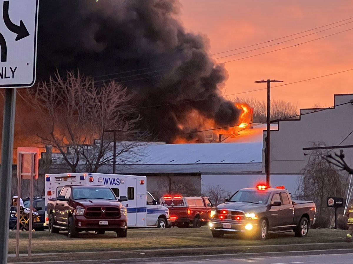 Route 104 in Williamson is shut down. Large fire at Thatcher. Fire appears to be at the rear of the property/structure. The smoke can be seen for miles down 104