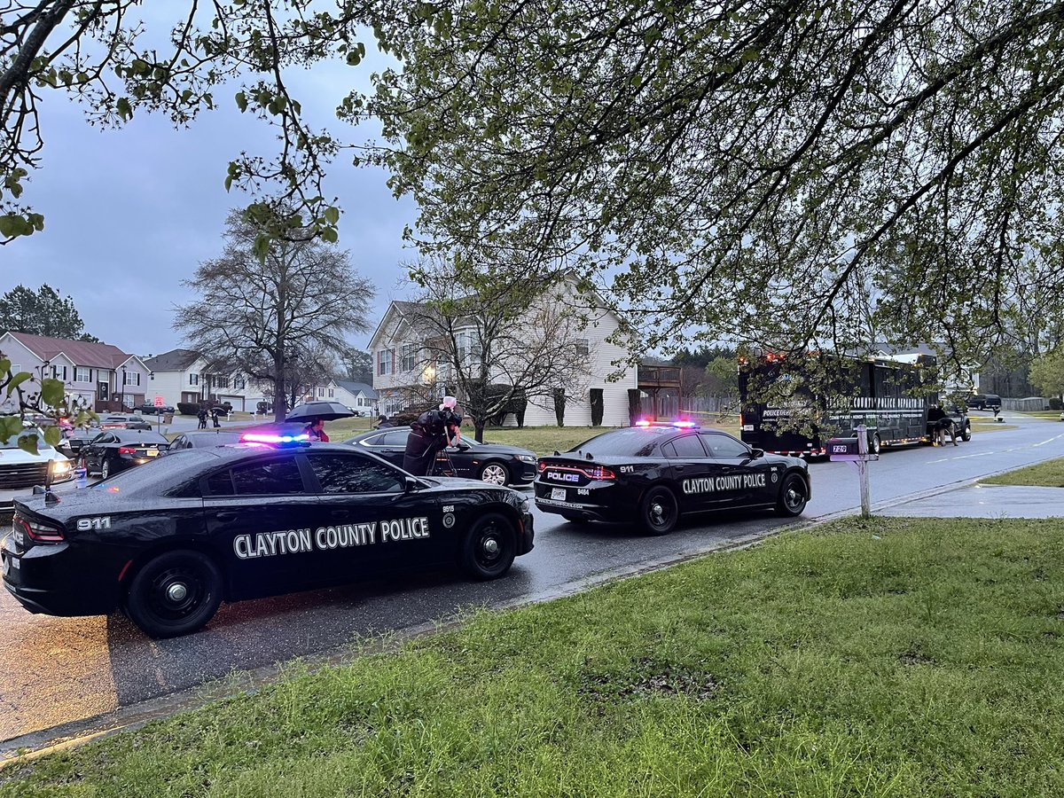 scene of an officer involved shooting in Clayton Co. Police aren't commenting yet but I did speak with a resident who says her husband is dead & he thought someone was breaking into their home. She says he went to get his gun and now he's dead