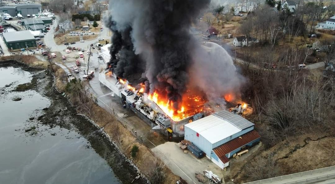 Belfast Maine - Waldo County - Multiple Alarm Fire with Hazmat Team Response - Penobscot McCrum - Pierce Street/Water Street - Firefighting operations ongoing and crews are working to protect ammonia storage tanks.  Per Belfast PD, area evacuations in progress. Photo Frank Coombs