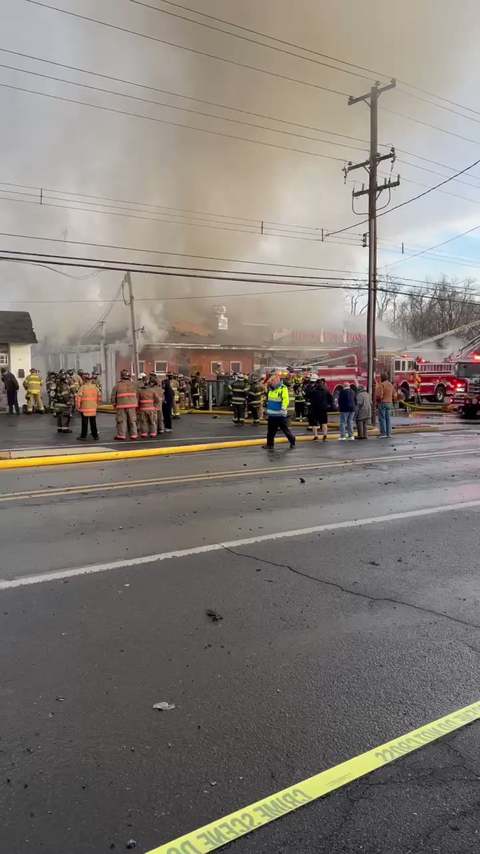 scene of a 3-alarm fire at Band Box Pizza in Levittown. Smoke still billowing from the bowling alley and crews are actively trying to get the fire under control