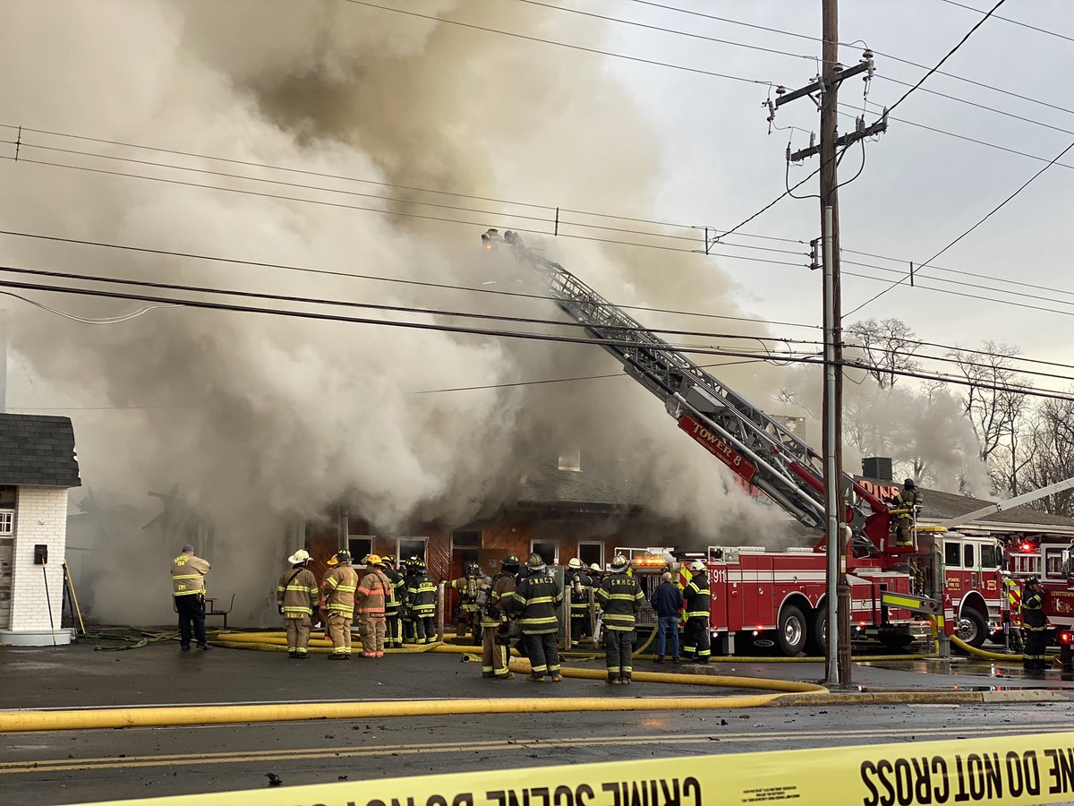 A loss for the Levittown community, firefighters are working to extinguish the 3-alarm fire here at Levittown Lanes. @6abc   Thick smoke is billowing out of the building, officials say the fire is threatening neighboring properties