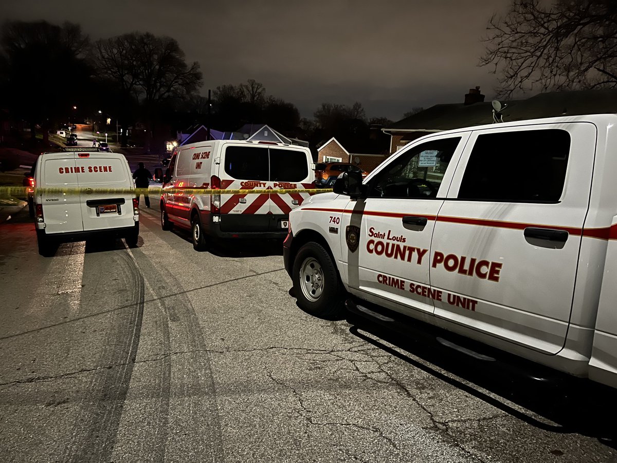 Scene in Northwoods this AM on Colonial Avenue just off Natural Bridge. Murder victim found inside home after Northwoods Police came under fire responding to scene. Fortunately no officers hit although one taken to hospital as precaution. County Pd has taken over investigation