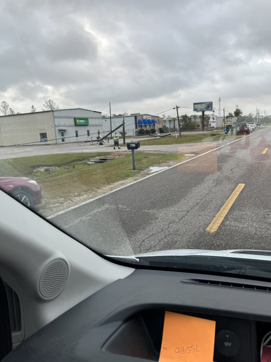 This is Theodore, Alabama Rangeline road. Lots of power polls snapped at the tops & lines down.