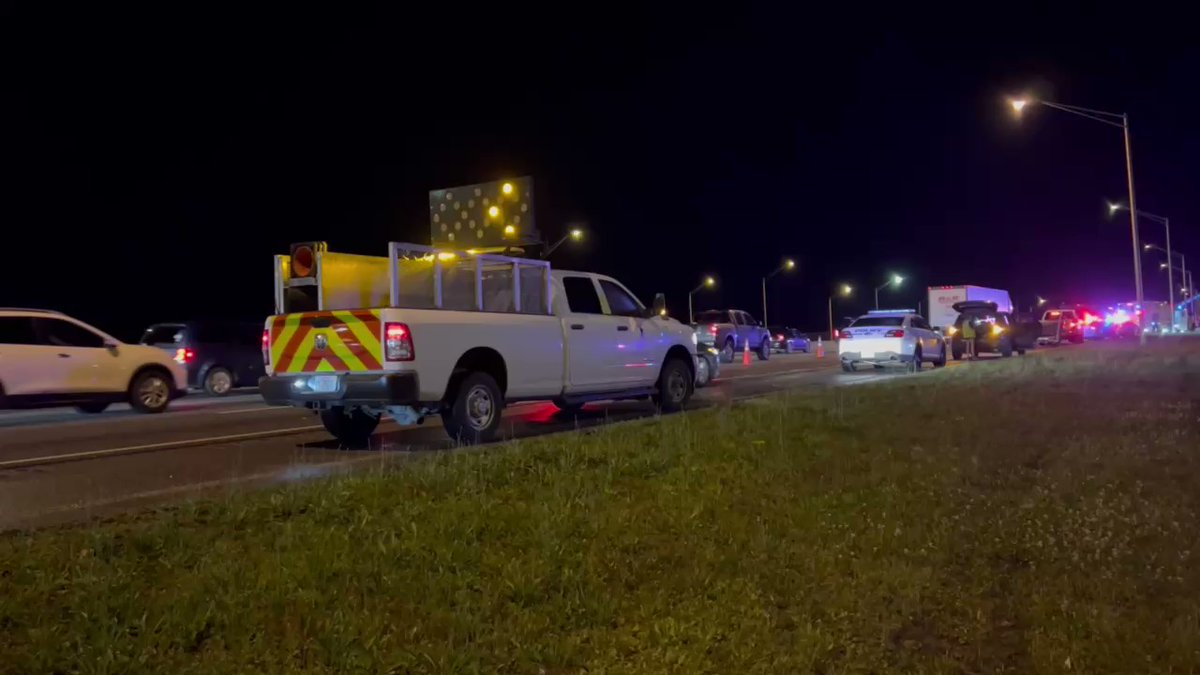 There is a massive law enforcement presence off I-95 and SR 9B. Investigators appear to be searching a retention pond off the highway. JFRD says a car is submerged in the pond after a traffic accident.