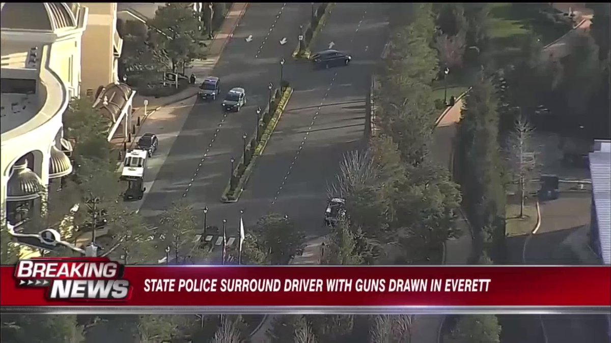 @MassStatePolice have  one person in custody after a pursuit that ended outside the Encore Boston Harbor casino. They say the suspect hit several cruisers.   Troopers approaching the suspect with guns drawn.