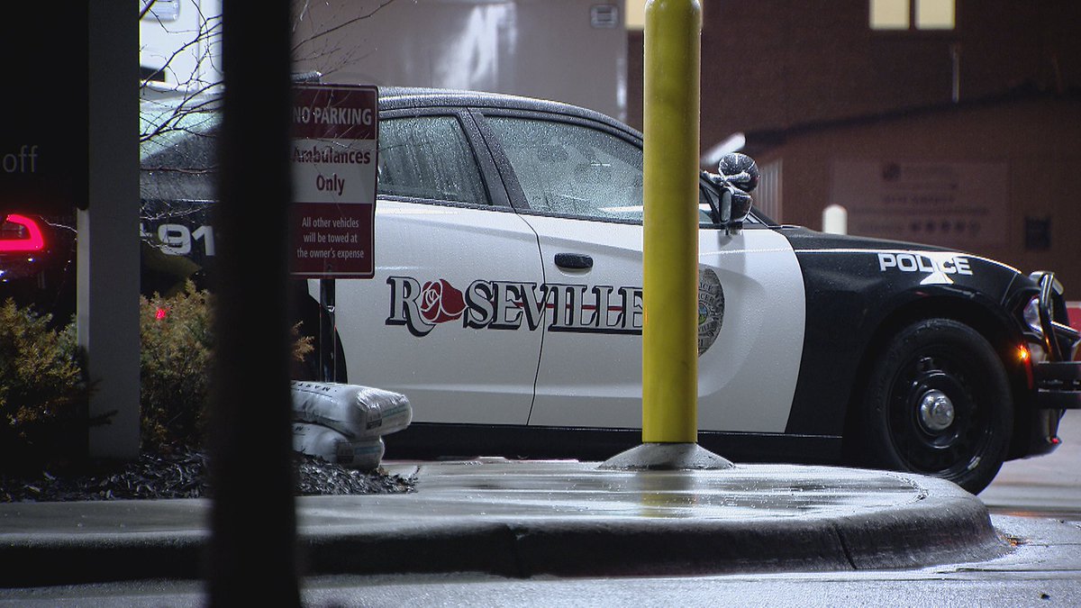 This was the scene outside Regions Hospital in St. Paul where we saw several Roseville squad cars parked outside along with  Roseville officers milling about.