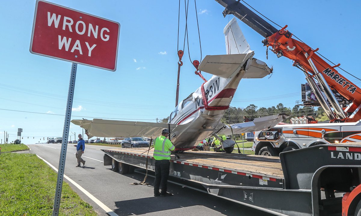 Plane crash-lands on Cobb Parkway, pilot suffers minor leg injury