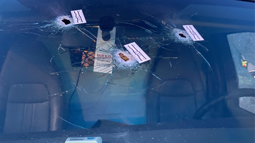 photos of and around the scene which left 2 boys dead and 9 people injured.