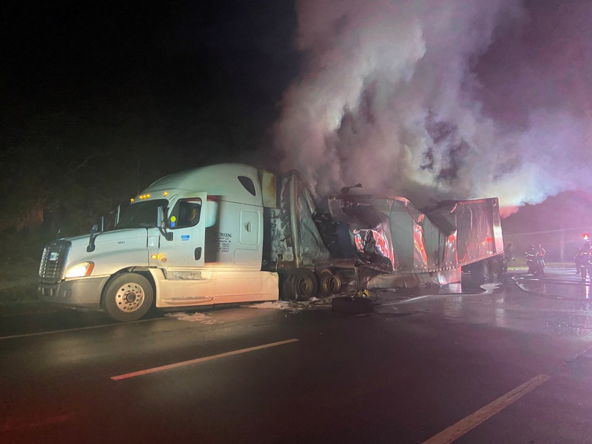 A semi truck carrying bags of cocoa catches fire this morning along I-95 in Daytona Beach