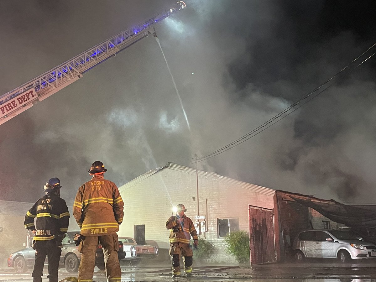 A nearby business owner tells the building on fire is a furniture refinishing business. He says there are a lot of chemicals inside, which is why he heard what he thought were gunshots around 4:20 a.m. He now believes it was an explosion