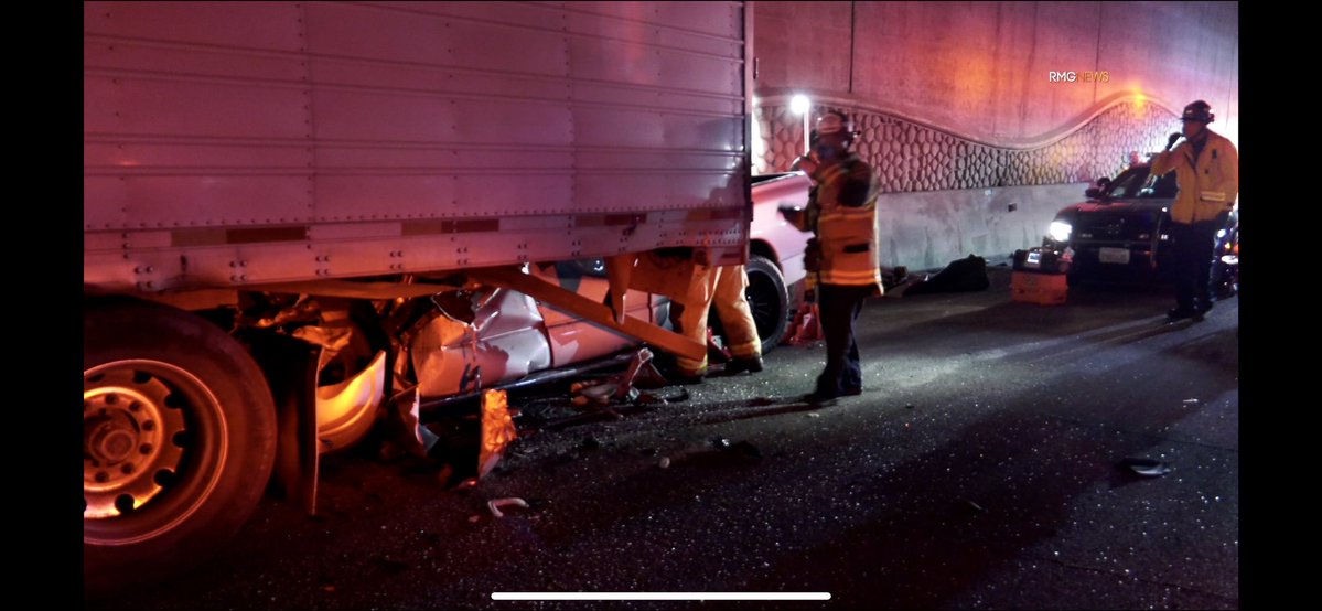 Rialto I210 freeway accident involving a vehicle with two victims trapped completely underneath of a semi. It took almost 2 hours to get the second patient extricated. Both transported to nearby hospitals