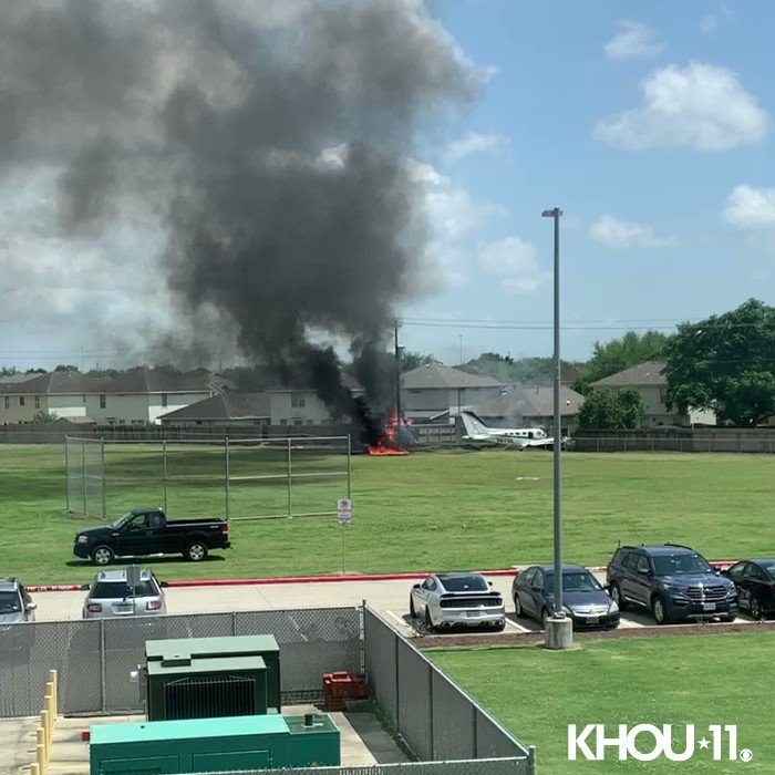 Viewer video captured fire after a plane crashed near Hobby Airport today. According to @HoustonFire, four people were on board. All four were able to get out without injury