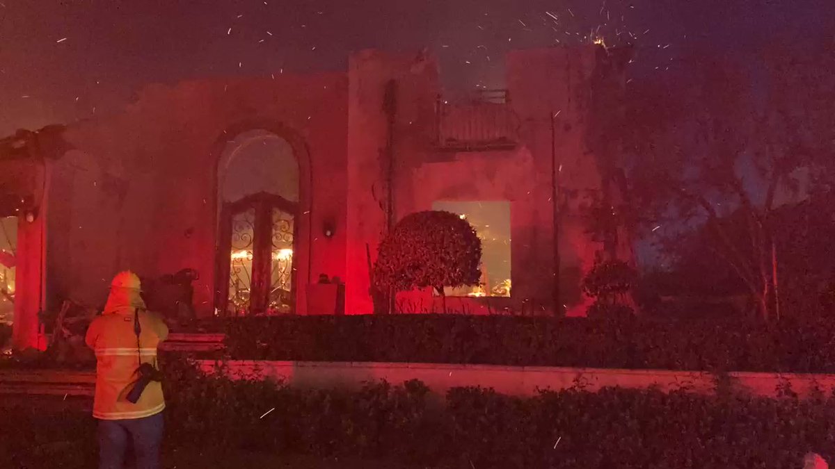 It is a total disaster zone on Coronado Pointe in Laguna Niguel. More than 20 houses have been lost in this fire. The winds are kicking up embers keeping firefighters busy trying to prevent more houses from going up.