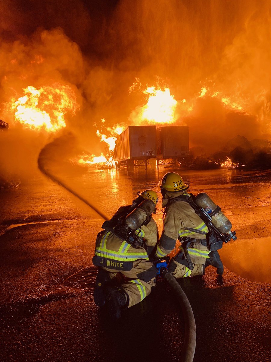 Crews from all over the valley are working a pallet fire along Buckeye and 39th Ave  @PHXFire shared pics of fire fighters battling intense flames. They say wind picked up and spread some flames a quarter mile East.