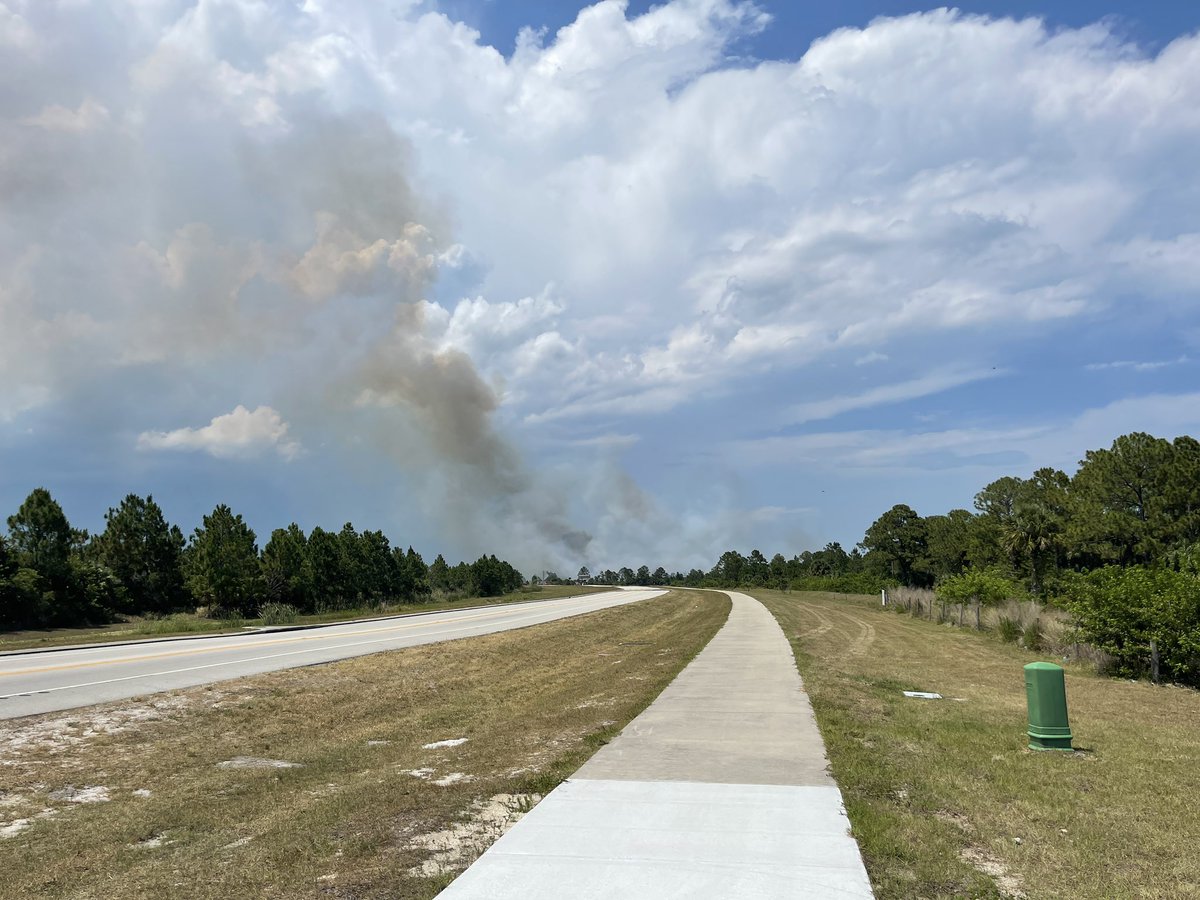 area of St John's Heritage Pkway between Pace and Emerson shutdown due to 1/2 acre wildfire. Named 'Heritage Fire'