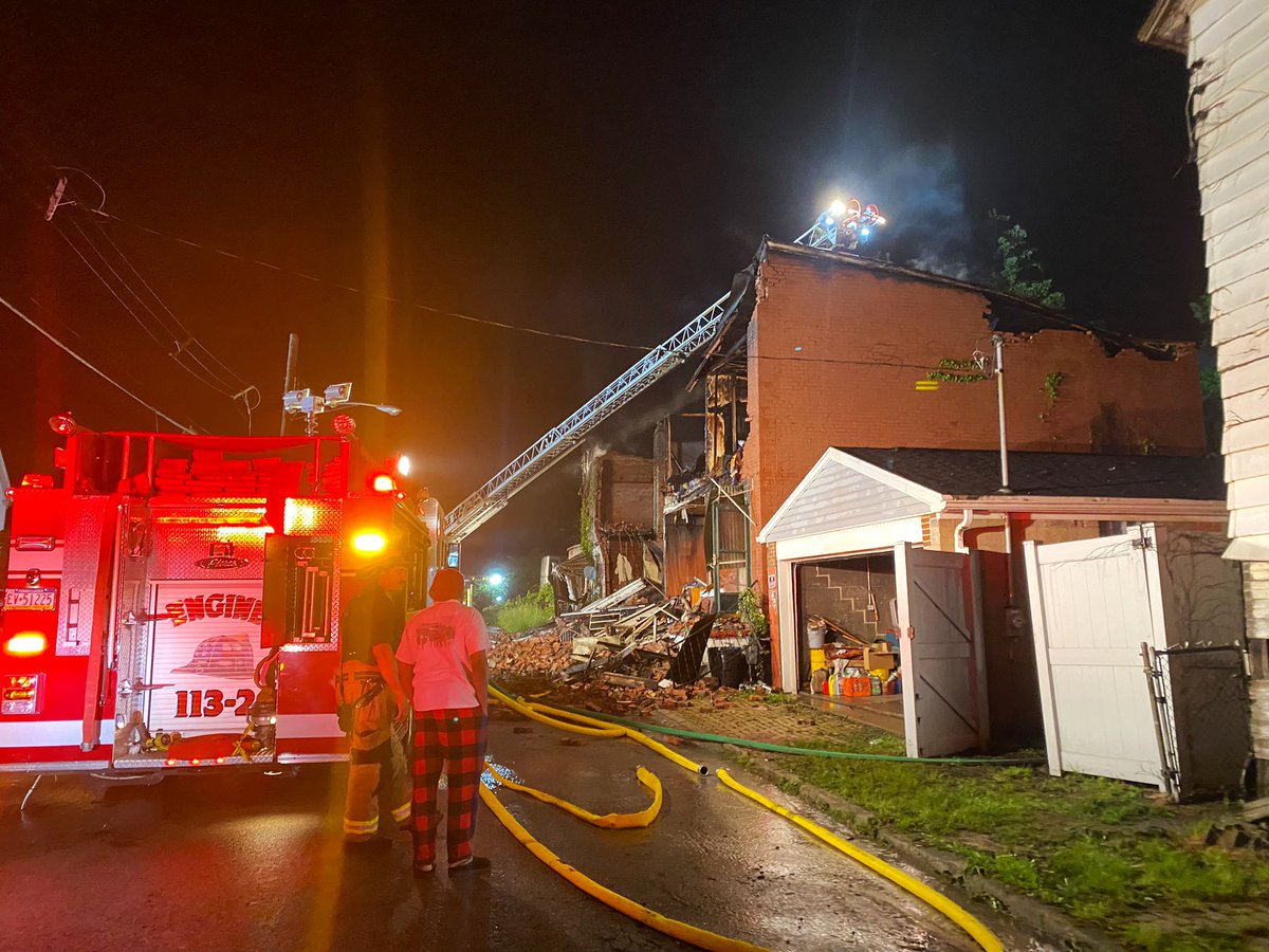 Massive fire rips through abandoned rowhomes in Braddock, causing part of building to collapse. No injuries reported. Firefighters still on the scene