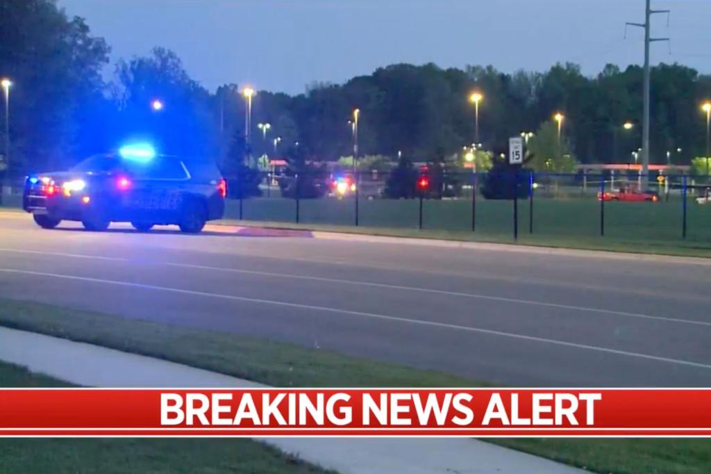 Gunfire outside Michigan high school graduation injures two