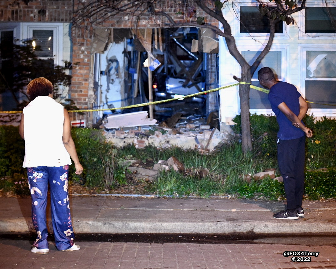 A resident inside his Bryan Place home escapes injury as a pickup drives down his hallway. The truck entered the front of the home destroying the living room, bathroom and bedroom before crashing through the rear wall.