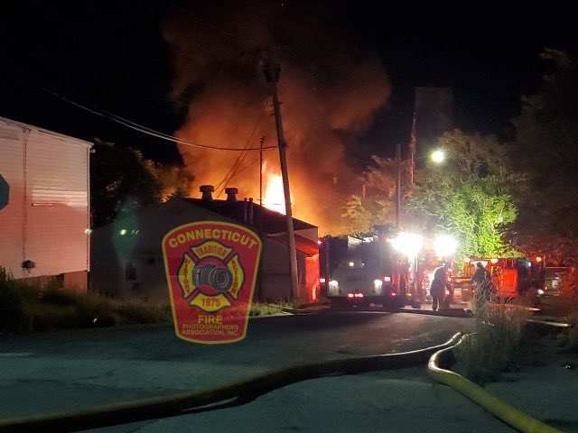 N scene of a 3rd alarm fire in a vacant, mill in Norwich, CT.   fire to be in a collapsed section that had previously burned a few years ago