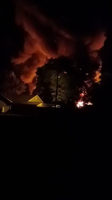 A building that housed a former textile mill burned earlier tonight in the Rockingham area of Richmond County