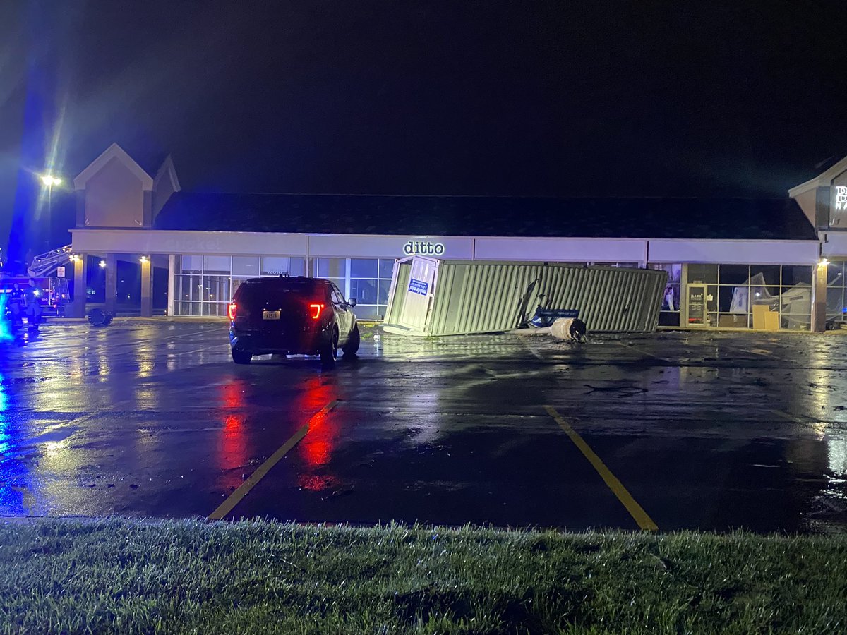 Got some damage near the shopping complex in front of Sam's Club in Lenexa. FD is here checking on gas lines. There is some window damage to one of the stores. The storm moved the shipping container & took down a light pole