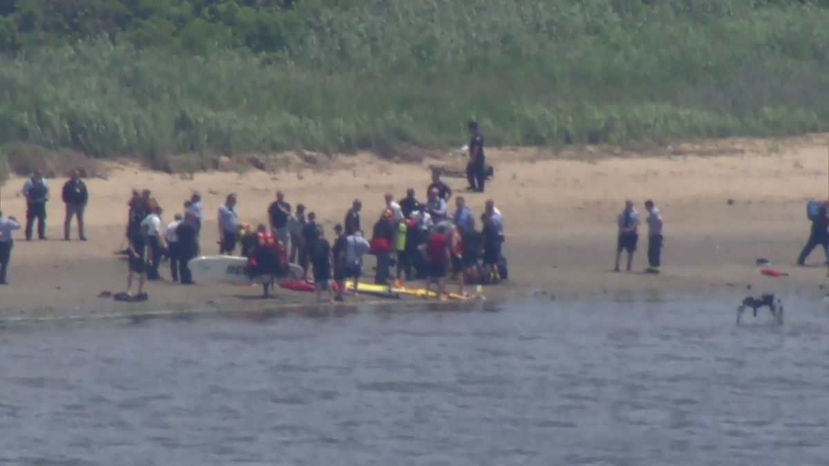 At least two people have been pulled from the waters of Jamaica Bay by emergency personnel near the North Channel Bridge in Queens. Their condition is unclear