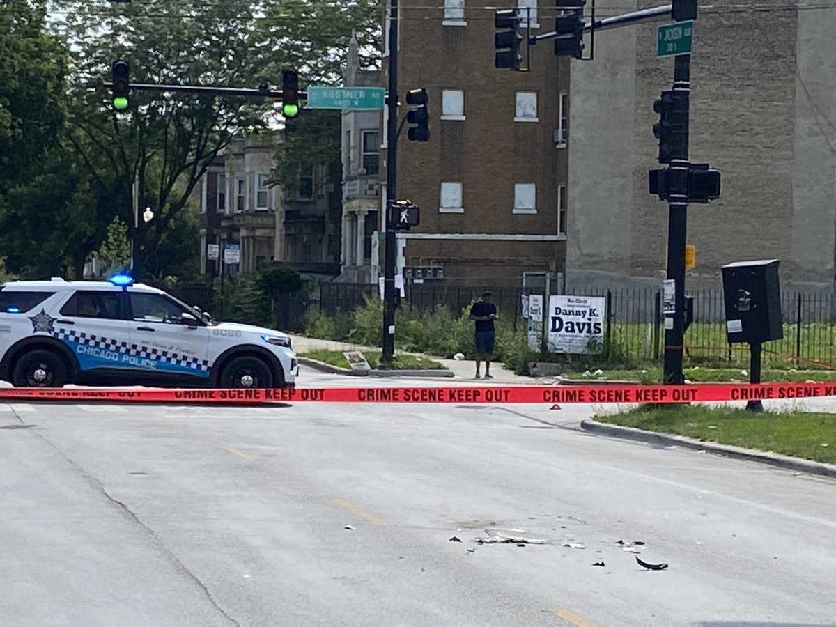 Call of officer down here @ Jackson & Kostner . This is the debris from the scene where someone stole a police cruiser. Officer — according to police radio — sustained lacerations to face.  Cruiser and suspect later crashed at Damon and Harrison