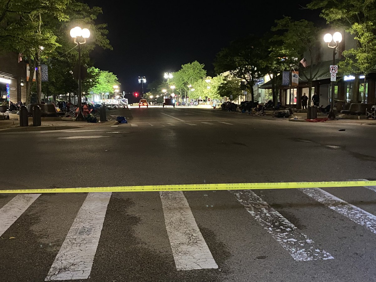 Quite an eerie scene here in Highland Park this morning.   Police still have the crime scene from yesterday's shooting taped off, and peoples belongings still line the parade route after storms rolled through overnight.   Suspect Bobby Crimo was taken into custody last night