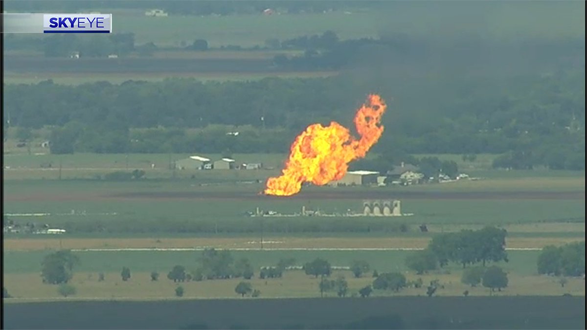 Flames from pipeline explosion shooting up about 300 feet in air in Fort Bend Co