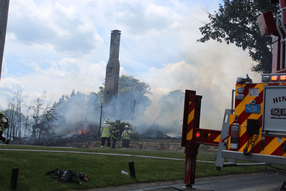 Still an active scene here in Hingham. A four-alarm fire destroyed a home on Mann Street. Nearby homes are being wet down due to heat and debris. The side and attic for the home next door were scorched