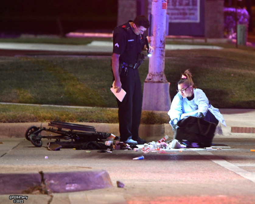 A driver is in custody after police say he struck a wheelchair bound woman and the man pushing her along Forest Ln. The woman was critically injured, the man was killed