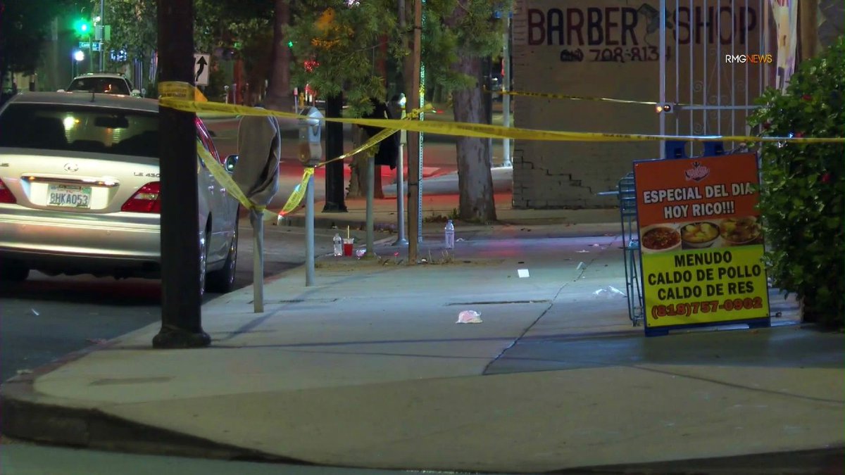 2 injured in Reseda robbery shooting; body of 1 suspect found nearby