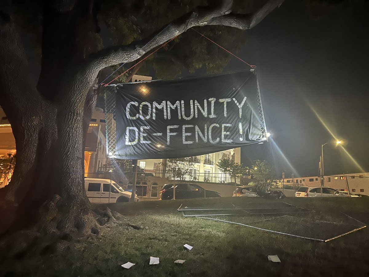 A bunch of the fencing around Echo Park Lake has been taken down. A sign was put up saying Community De-fence