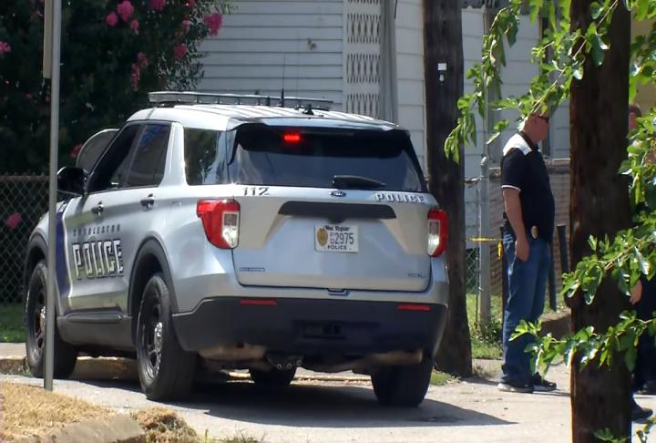 Shooting scene on Russell Street in Charleston, where dispatchers say one person apparently has been shot and one person has been detained