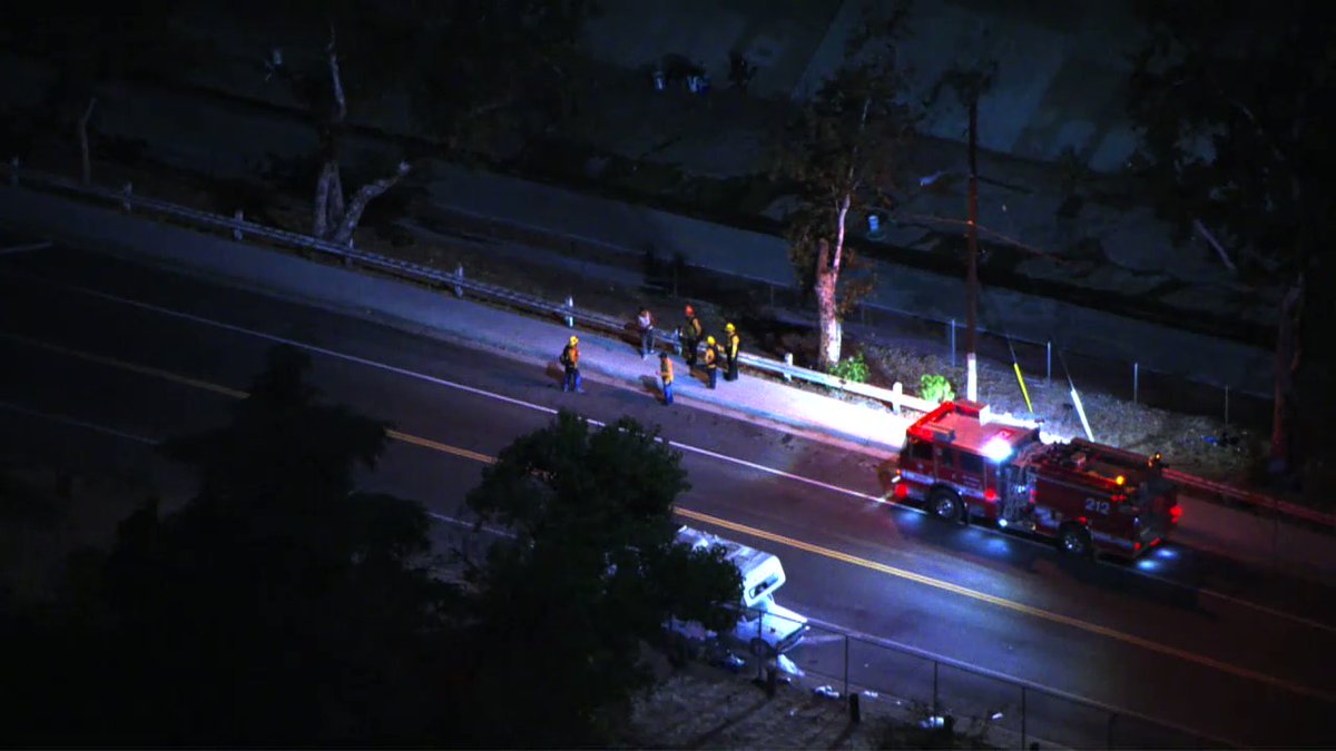 Fire Fighters detain an ARSON SUSPECT before LAPD Officers arrive on Griffin Drive, Montecito Heights. Four spot fires were started in brush at Ernest E. Debs Park. Suspect was ID'd by hikers walking on the trails