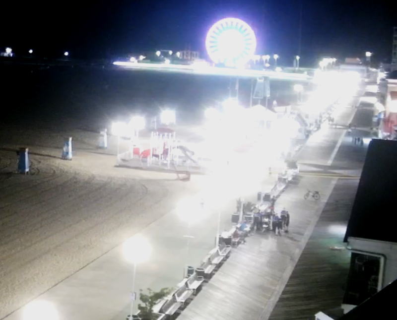 SHOOTING-- 1st St at Atlantic Avenue (Boardwalk) in downtown Ocean City, Maryland. Man shot in the arm. Police have closed the boardwalk to search for clues. Search is also in progress for several male suspects who fled on foot