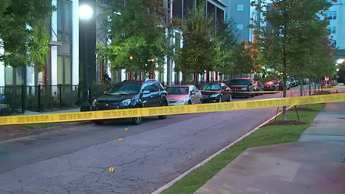 Atlanta Police are investigating after a security guard was shot early Thursday morning while trying to stop 3 people from breaking into cars