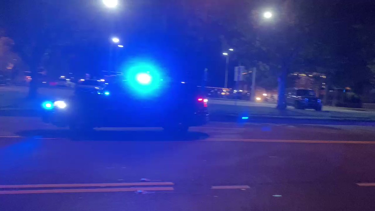 N. Marietta Parkway police cars flying towards Kennestone Hospital after two Cobb officers were shot and killed